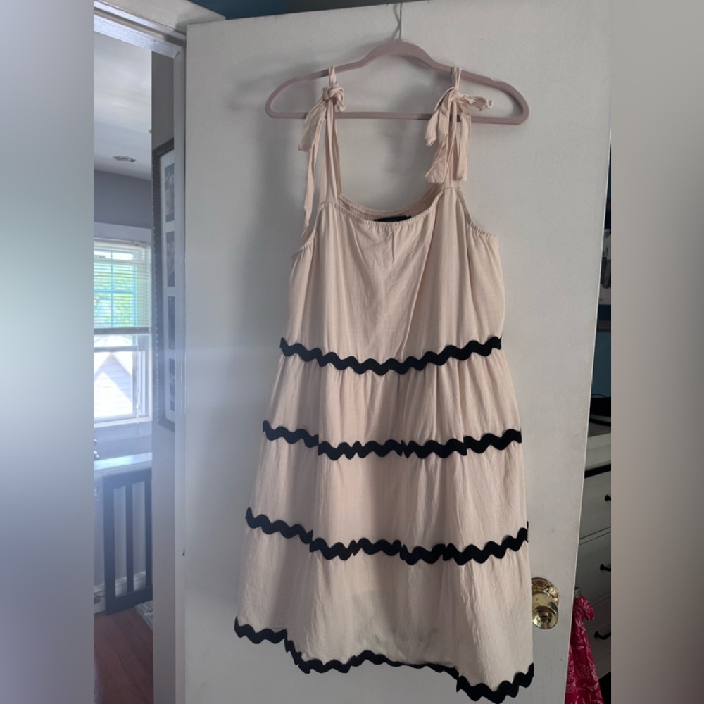 Chic Cream Dress with Black Accents